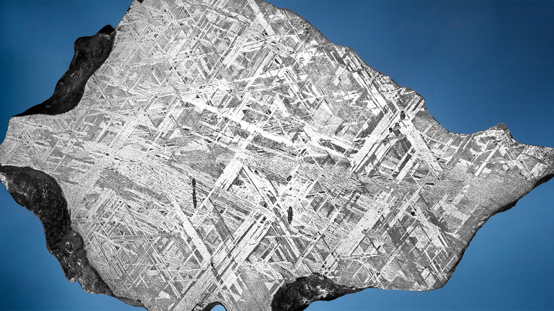 Illustration for article titled 30 Starry Wonders Hiding Inside of Dull Meteorites